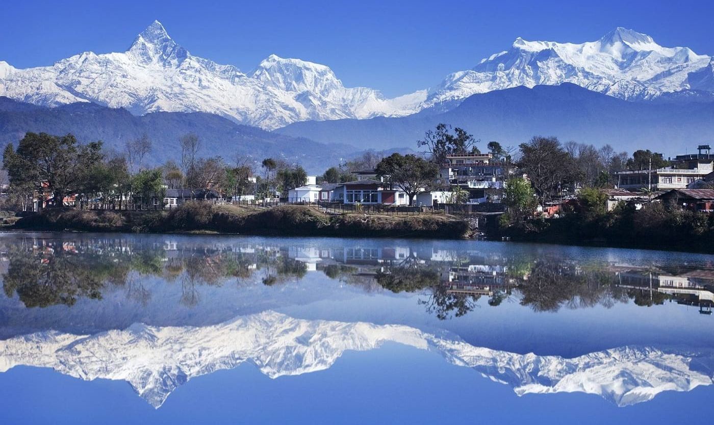 Macchapucchre ( Fishtail Mountain )  and Annapurna Himal from Phewa Tal in Pokhara