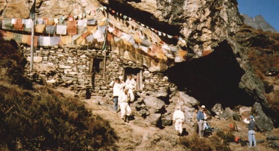 Cave Gompa ( Buddhist Manastery ) and Prayer Flags in Hinku Valley
