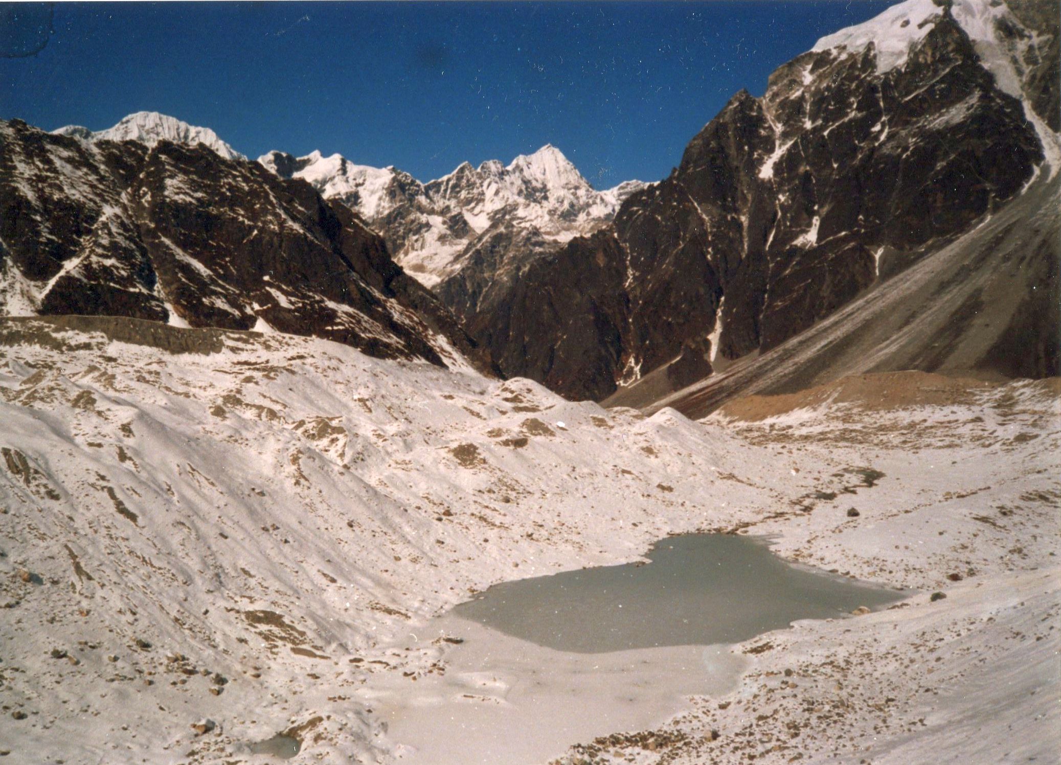 Descending to Glacier Lake beneath Tilman's Pass