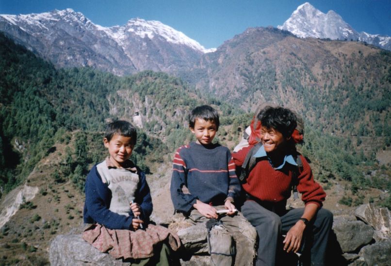 Nima Lakpa Sherpa trekking guide with two young Sherpas
