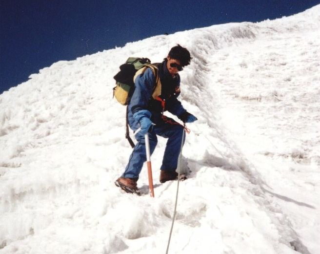 Nima Lakpa Sherpa descending steep snow slope from Yala Peak