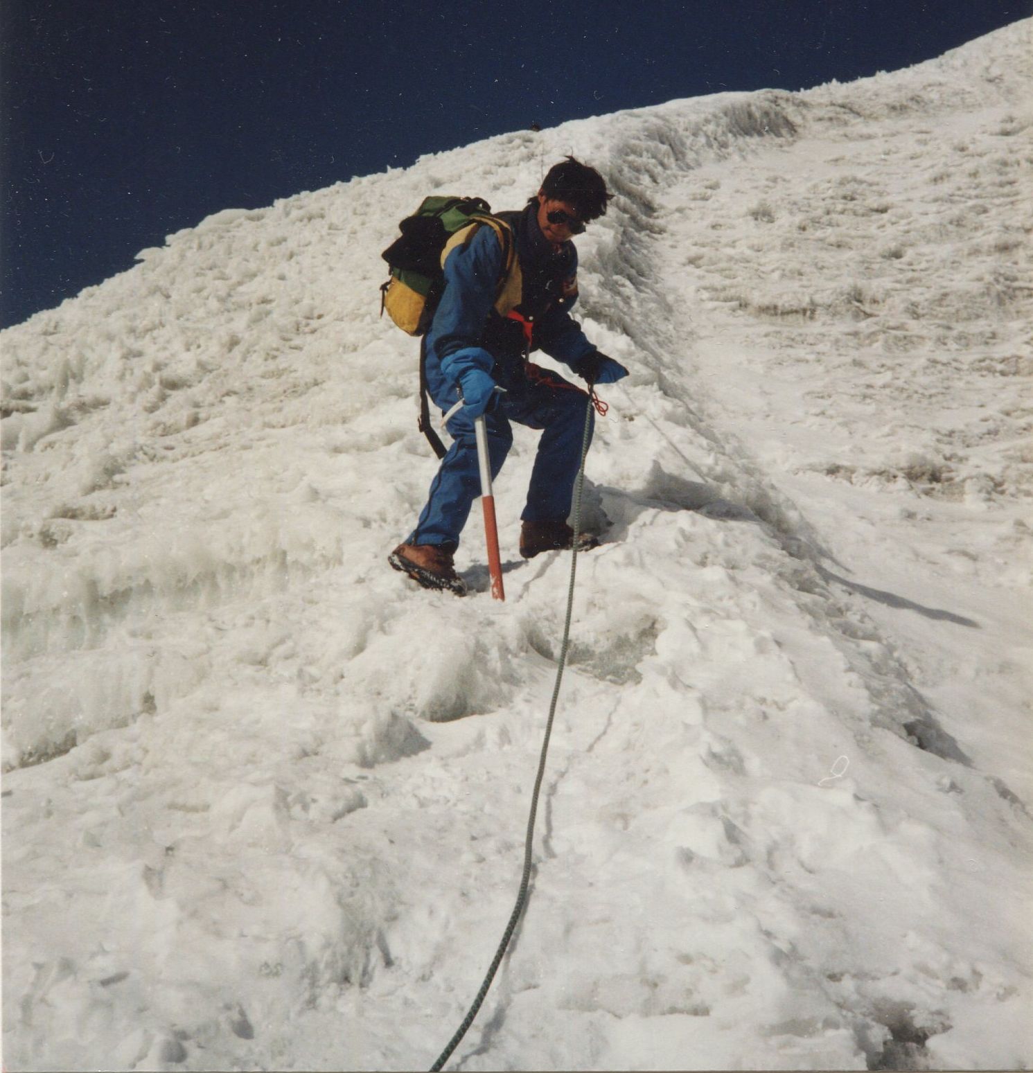 Nima Lakpa Sherpa descending steep snow slope from Yala Peak