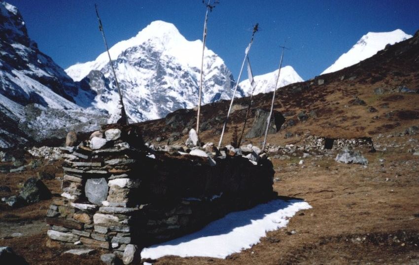 Mani Wall and Prayer Flags and Peak 6 / Mount Tutse ( 6739m ) in the Barun Valley