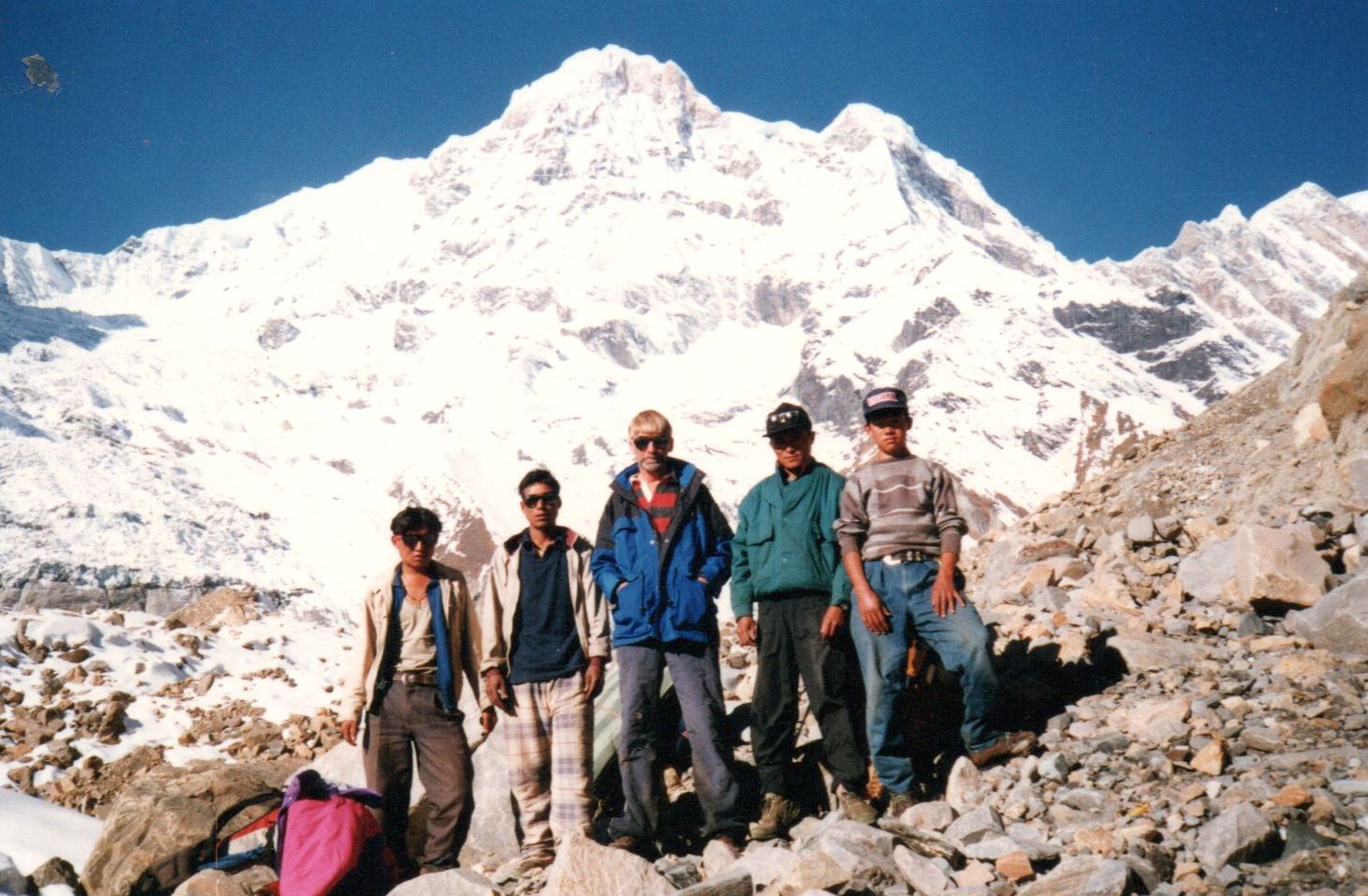 Trekking crew beneath Annapurna South Peak