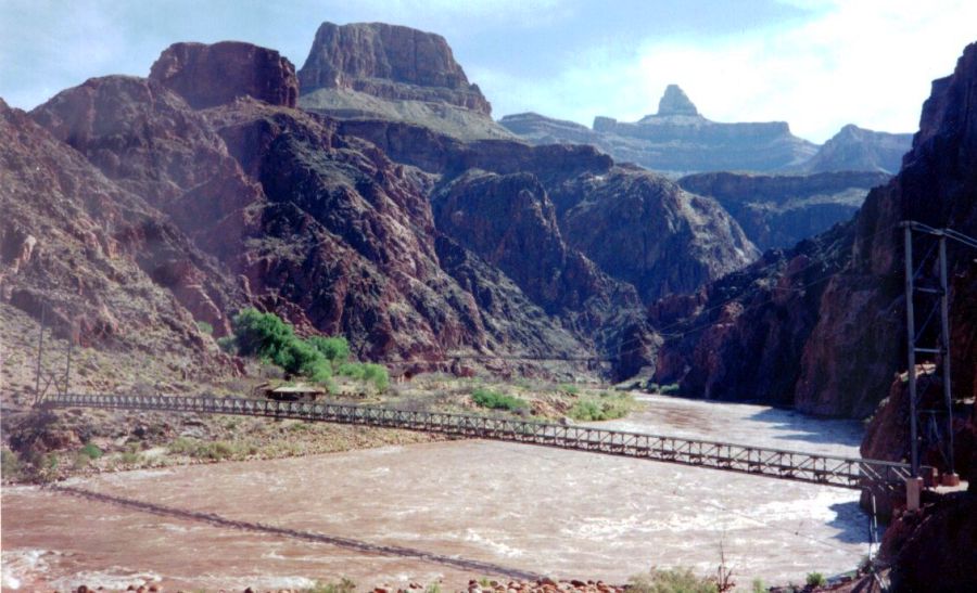 Silver Suspension Bridge across the Colorado River in Valley Floor of the Grand Canyon