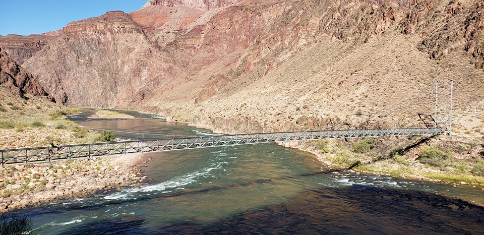 Silver Suspension Bridge across the Colorado River in Valley Floor of the Grand Canyon