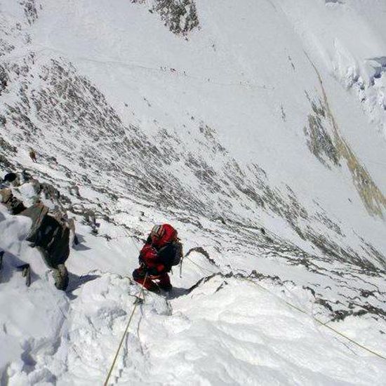 Climber on Geneva Spur of South Col ascent route of Mount Everest
