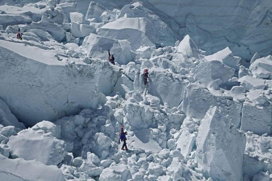 Climbers ascending the Khumbu Ice Fall on the South Col Route for Mount Everest