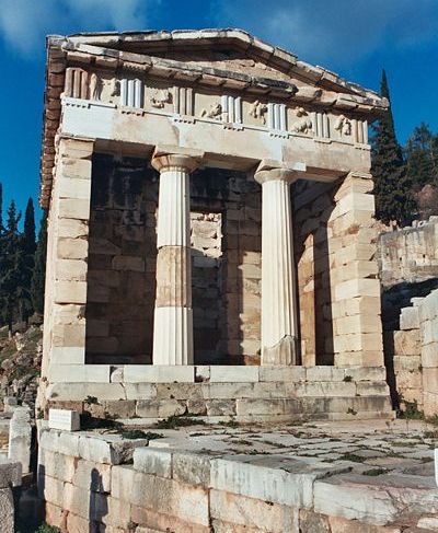 Ancient Temple - The Treasury of Athens - at Delphi in Greece