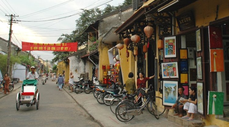 Street and shops in Hoi An fishing village in Vietnam