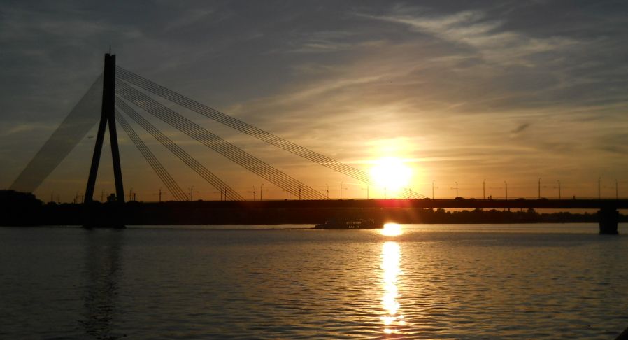 Sunset on Vansu Bridge ( Shroud Bridge ) over the Daugava River
