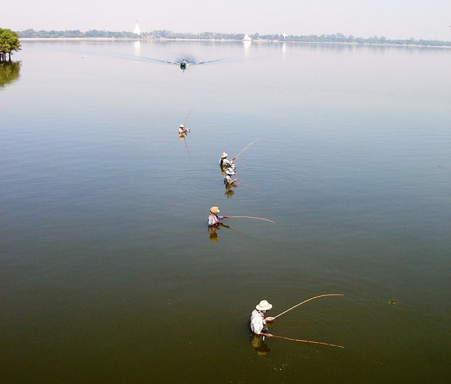 Fishermen in Taung-thaman Lake at Amarapura near Mandalay in northern Myanmar / Burma