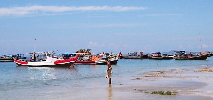 Fisherman and Fishing Boats at Ngapali Beach