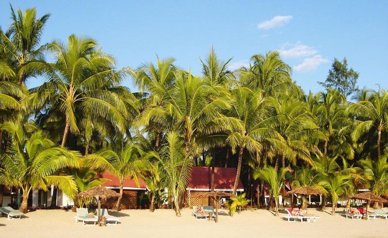 Resort Bungalows on Ngapali Beach on the Bay of Bengal on the western coast of Myanmar / Burma