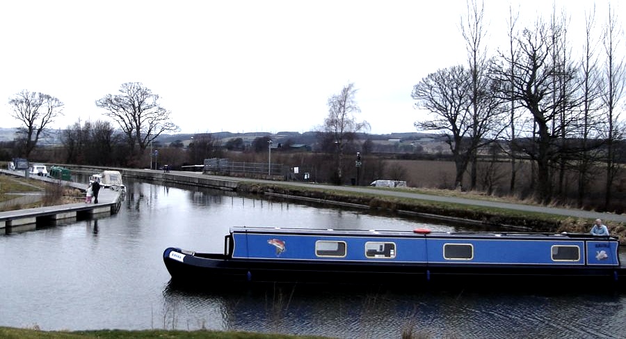 Boat entering Golden Jubilee to Falkirk Wheel from The Forth and Clyde Canal