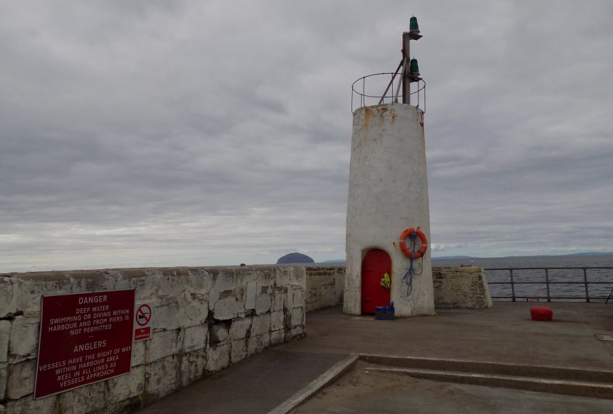 Beacon on harbour wall at Girvan