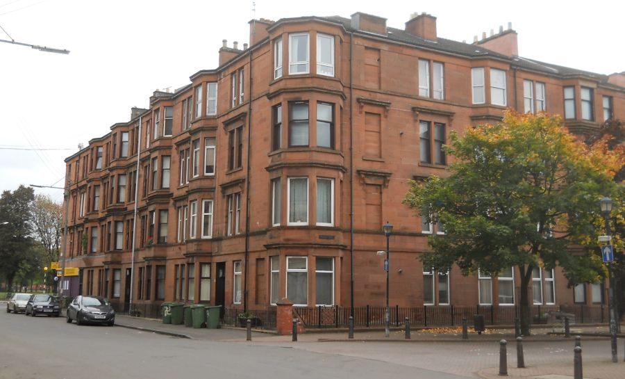 Traditional red sandstone tenement buildings in Govan District of Glasgow