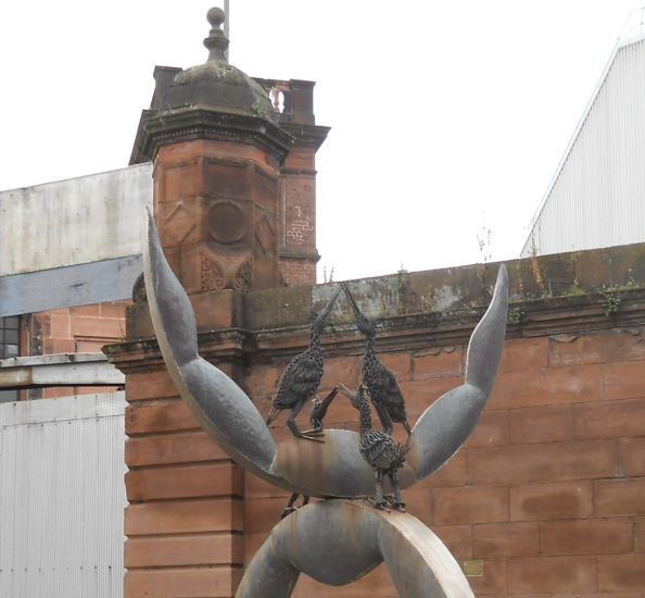 Cormorants statue outside the Fairfields Building in Govan, Glasgow