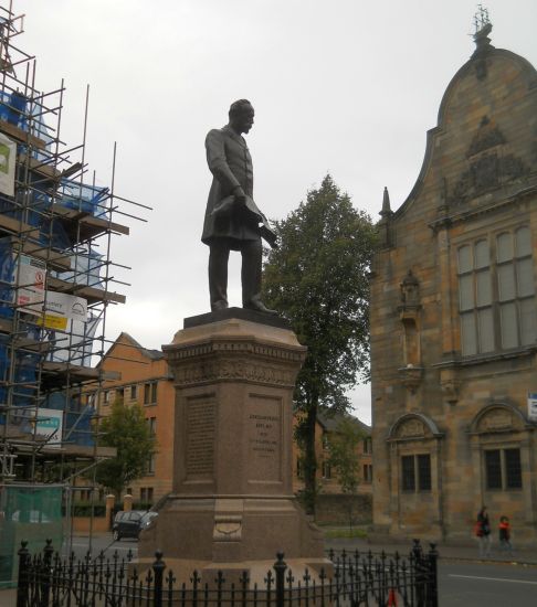 Sir William Pearce statue in front of the Pearce Institute Building in Govan