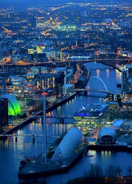 River Clyde illuminated at night in Glasgow, Scotland