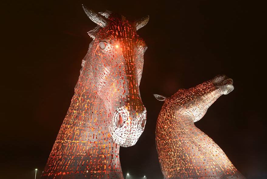 The Kelpies illuminated in red for the Poppy Appeal