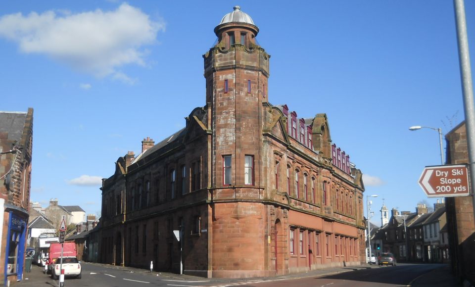 Former Cooperative Building of Traditional Red Sandstone in Newmilns