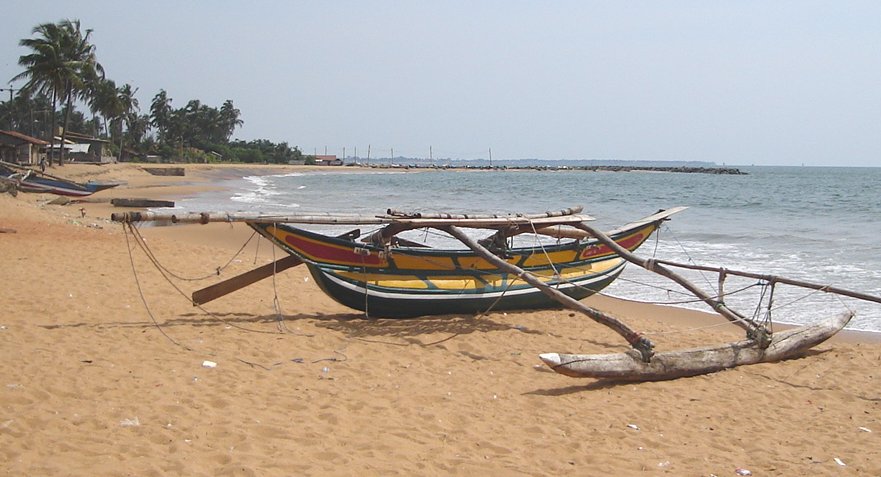 Outrigger Fishing Boat on beach at Negombo on West Coast of Sri Lanka