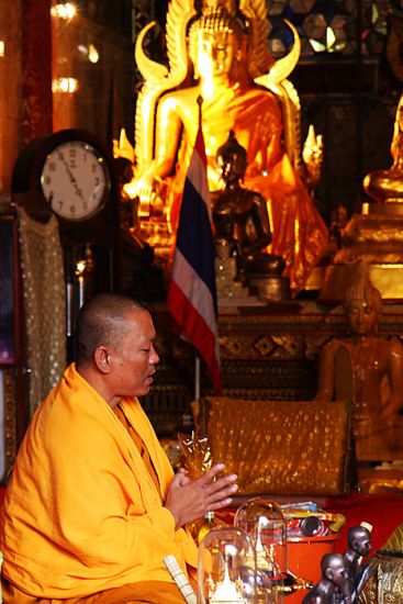 Thai monk and Buddha Icons