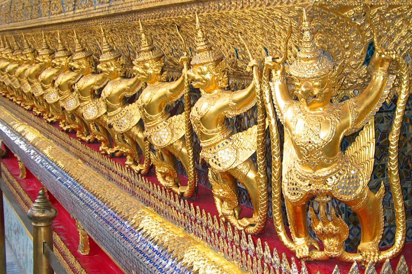 Buddhist icons in Wat Phra Kaew ( Temple of the Emerald Buddha ) in Bangkok