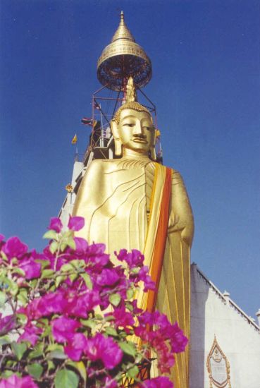 Standing Buddha ( Luang Pho To / Phrasiariyametri ) at Wat Intharawihan in Bangkok