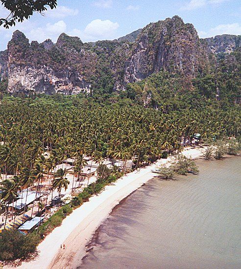 Beach, jungle and limestone cliffs at Hat Rai Leh ( East ) at Phra Nang near Krabi in Southern Thailand