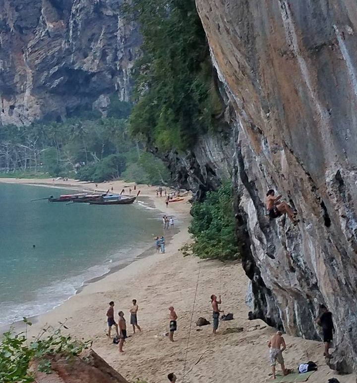 Climbing on limestone cliffs at Phra Nang near Krabi in Southern Thailand