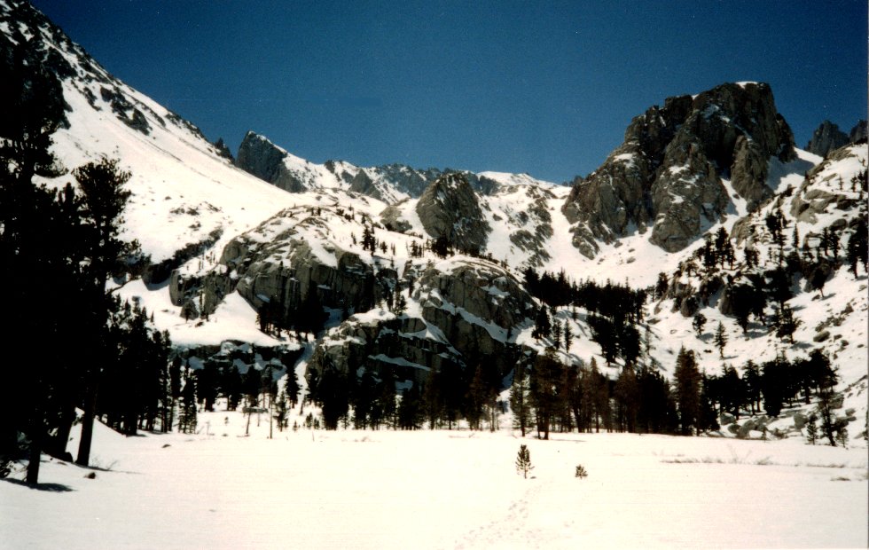 Snow-covered Mirror Lake on Mount Whitney beneath the Crest of the Sierra Nevada