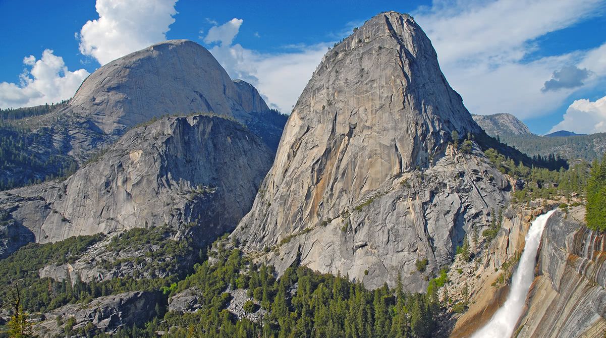 Half Dome and Liberty Cap next to Nevada Fall in Yosemite Valley