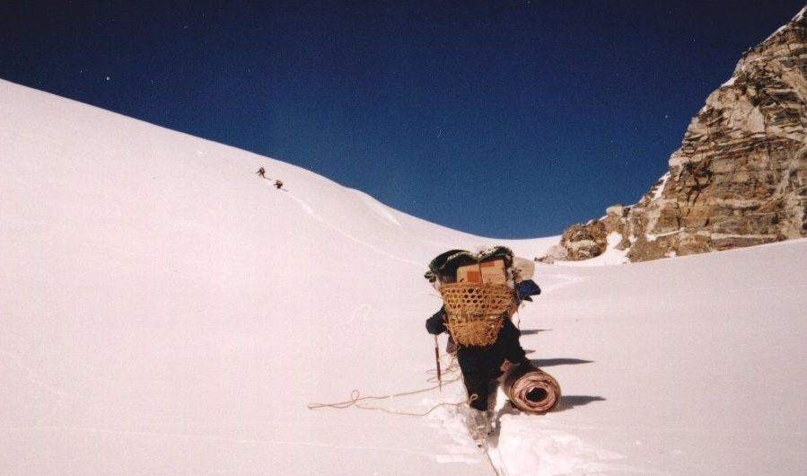 Climbing Final snow slopes to Tilman's Pass