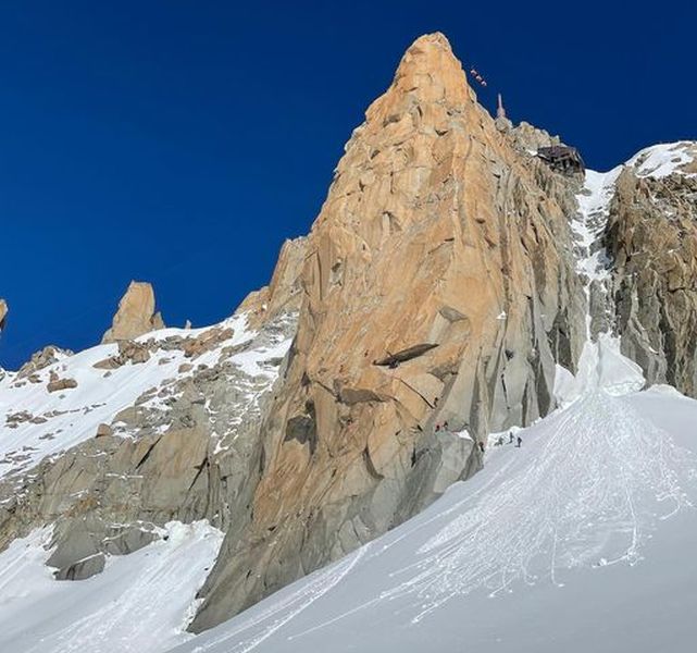 South Face of Aiguille du Midi above Col du Midi in the French Alps at Chamonix