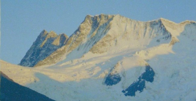 Finsteraarhorn from the Schreckhorn in the Bernese Oberlands region of the Swiss Alps