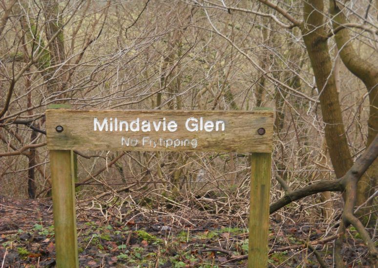 Signpost in the woods of Milndavie Glen above Blanefield
