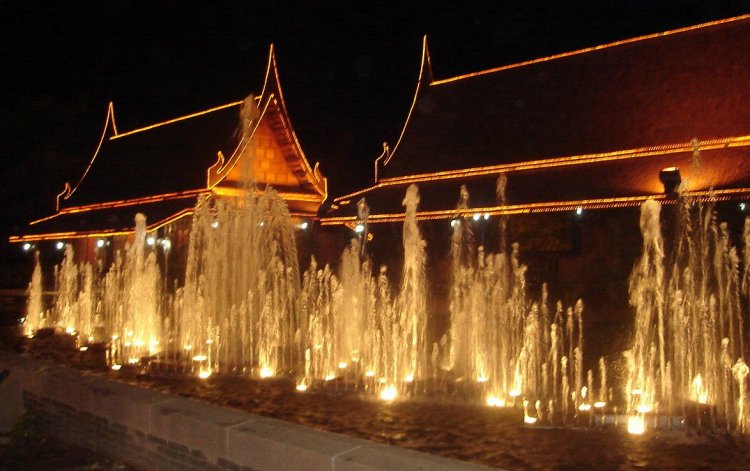 Traditional-style Buildings illuminated at night in Phitsanulok in Northern Thailand