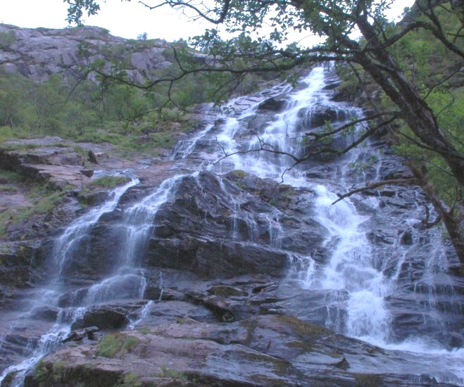 Steall waterfall in Glen Nevis beneath An Gearanach in the Mamores above Glen Nevis